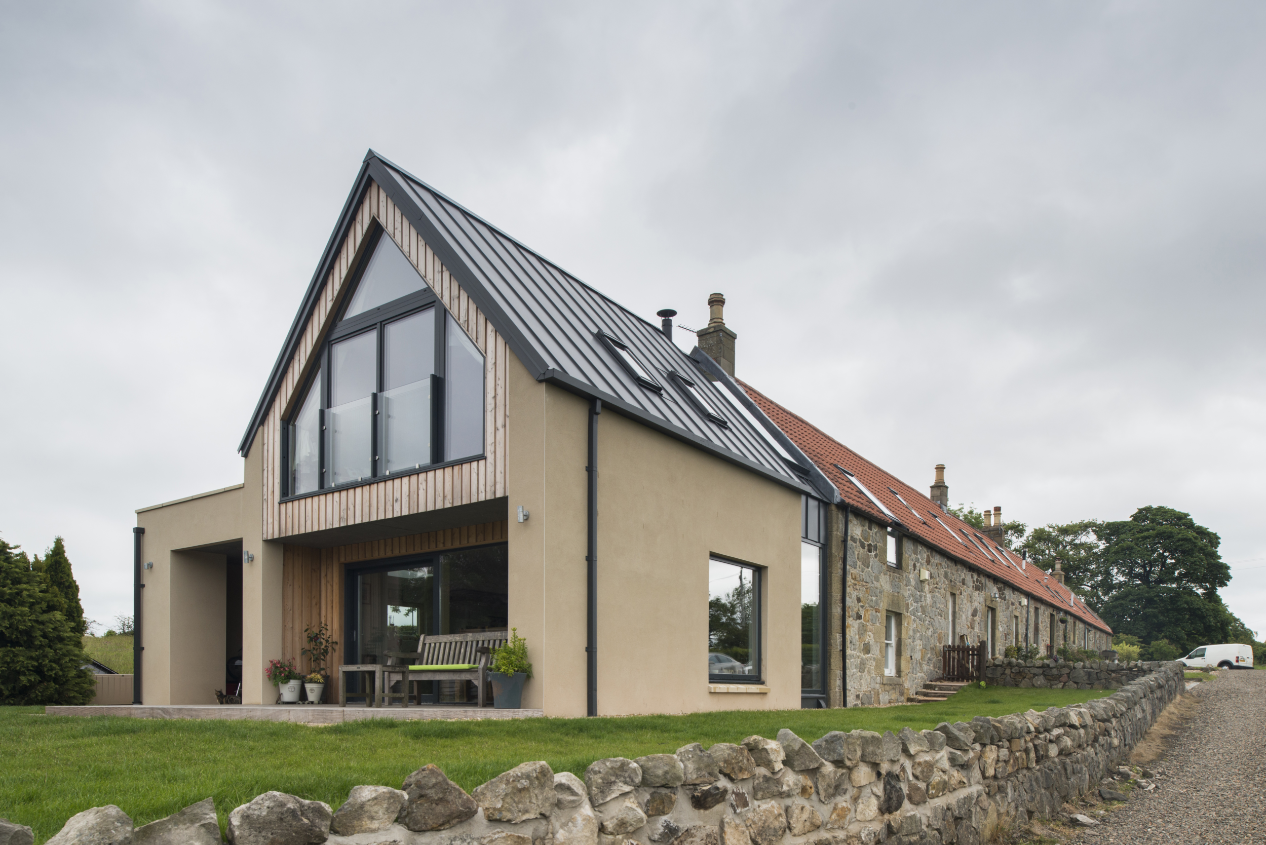 Beautiful home extension using metal standing seam roof from Catnic