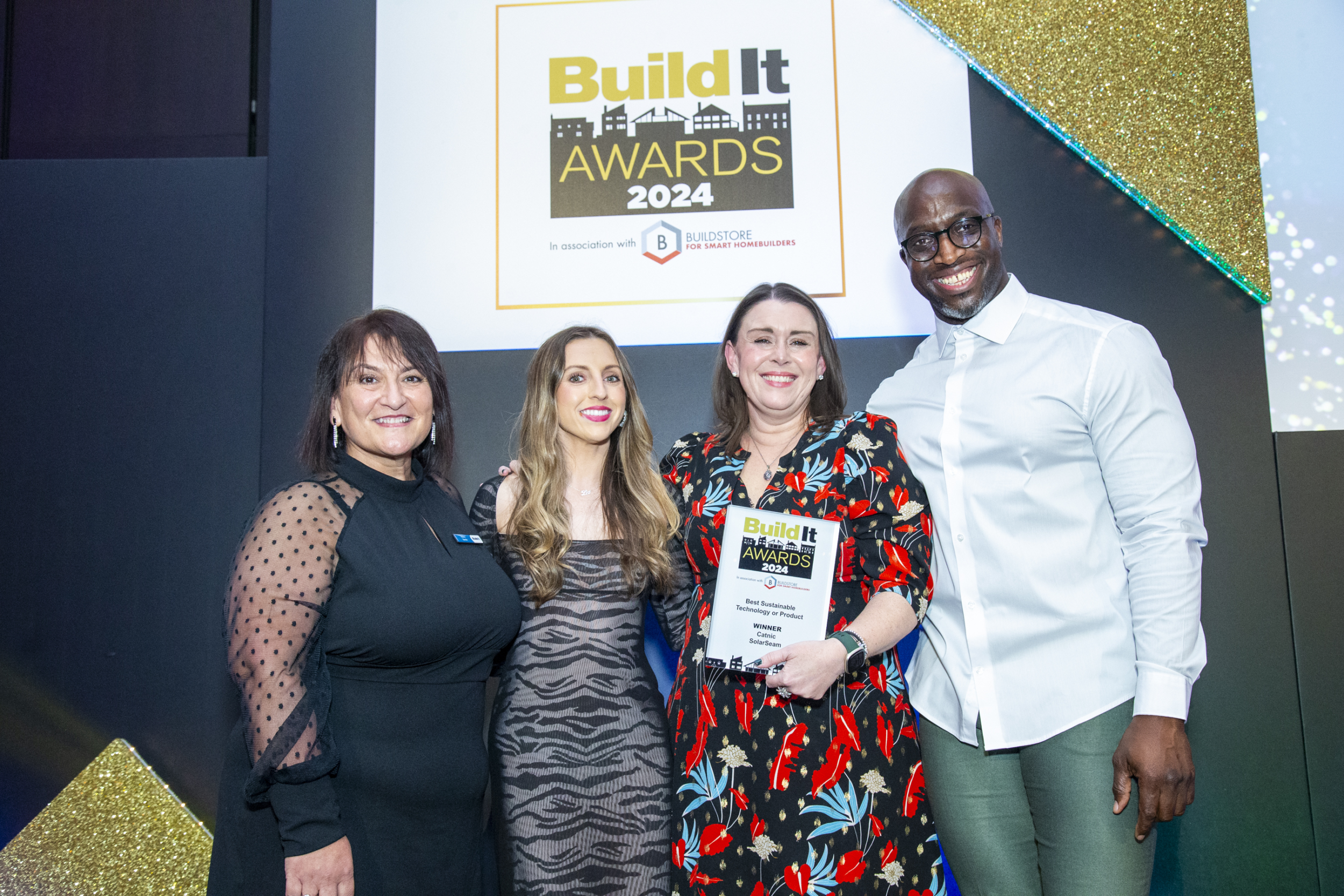 Brydie Connolly and Amanada Hinks Edwards accepting awards in 2024