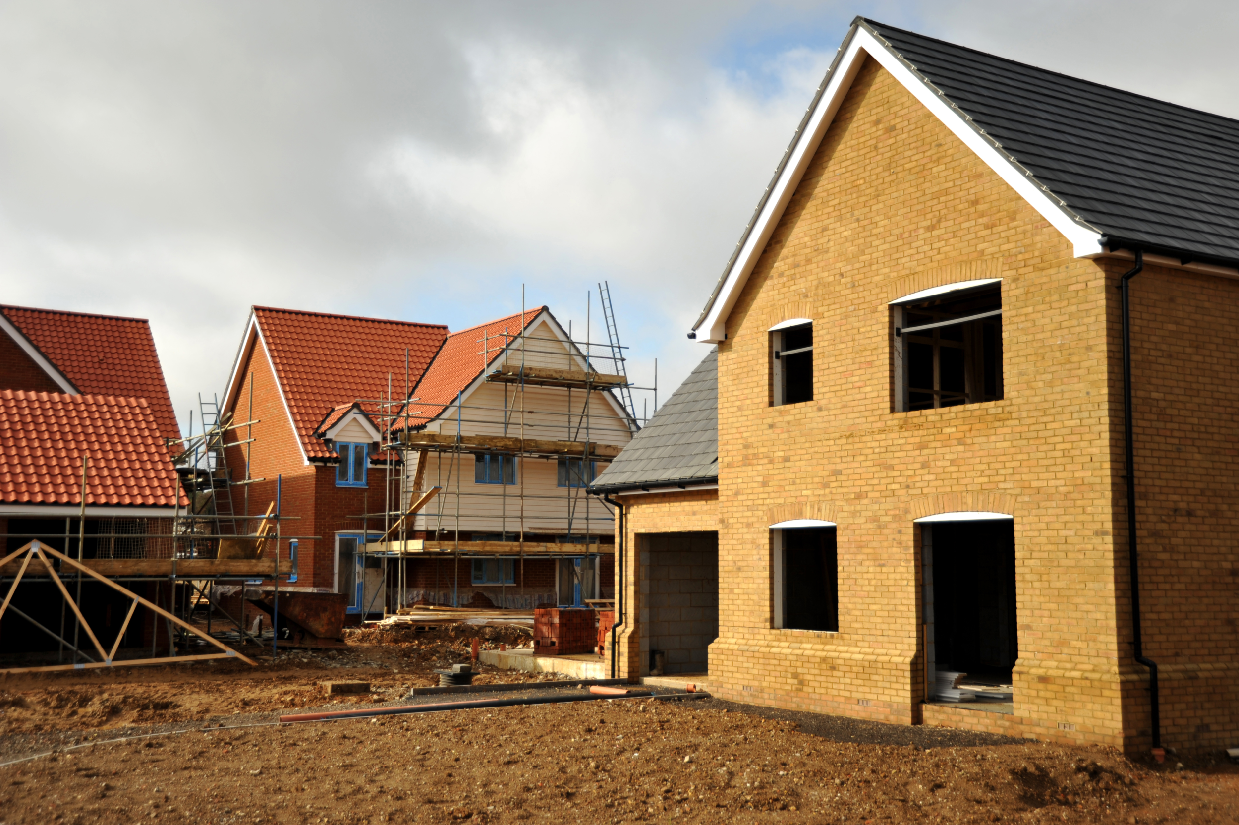 Multiple site hosuing development in UK, showing window and door openings